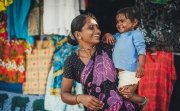 India, Goa, the village of Benaulim, a mother and her child.