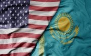 big waving flag of united states of america and national flag of kazakhstan