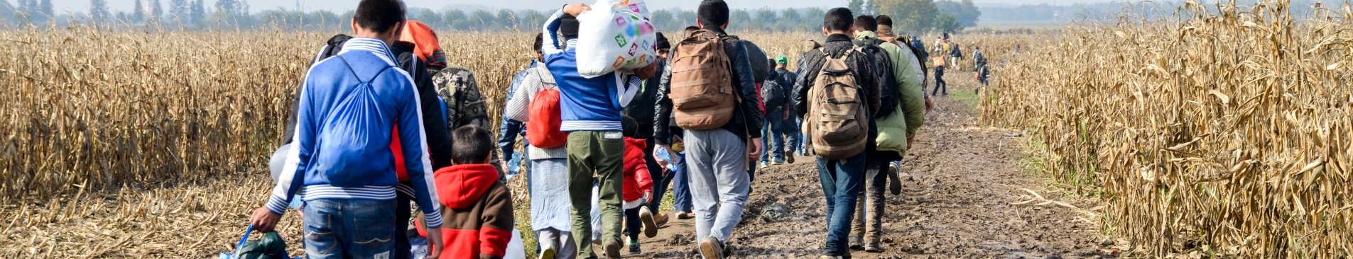 Syrian refugees crossing the border between Serbia and Croatia