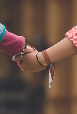 Norwegian and Taiwanese Indigenous youth holding hands