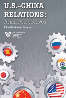 The cover of the book featuring gears with various countries' flags on the gears.