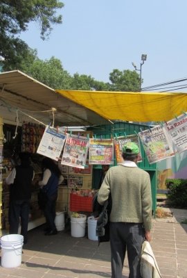 Mexico City/Mexico-5/9/16: A man approaches a newsstand on Avenida Paseo de la Reforma. 