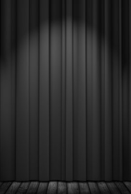 Black theatre curtains with three spotlights