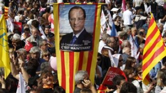 Supporters gather for Francois Hollande, Socialist Party candidate for the 2012 French presidential election