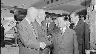 President Dwight D. Eisenhower and Secretary of State John Foster Dulles (from left) greet South Vietnam's President Ngo Dinh Diem at Washington National Airport. Source: National Archives.