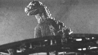 A behind the scenes shot of the 1954 Tōhō film Gojira, showing the original Godzilla as an ancient radiation-breathing monster awakened by the hydrogen bomb. Released months after the Lucky Dragon accident during the Castle Bravo test, the movie spoke to Japan's victimization by nuclear weapons." Source: Wikimedia Commons.