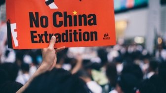 Protester holds sign in Hong Kong extradition protests. Source: Unsplash.com