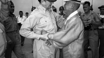 Syngman Rhee (left) greets US General Douglas MacArthur at Kimpo Air Force Base.