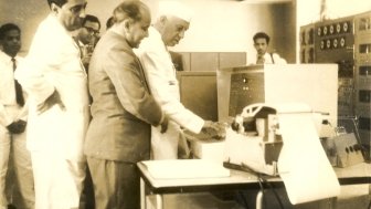 Image: Professor M.S. Narasimhan demonstrating the first Indian digital computer to Jawaharlal Nehru and Homi Bhabha at Tata Institute of Fundamental Research, via Wikimedia Commons, CC BY-SA 4.0.