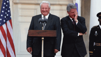 resident William J. Clinton and President Boris Nikolayevich Yeltsin delivering a joint press statement on the steps of Springwood, Franklin Delano Roosevelt's historic home in Hyde Park, New York. The image was photographed by Ralph Alswang.