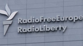 Logo of Radio Free Europe/Radio Liberty on its newly constructed building in Prague