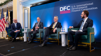 Mark Kennedy moderates a panel at the DFC 5th anniversary event