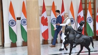 Trudeau and Modi Walking Down a Hall