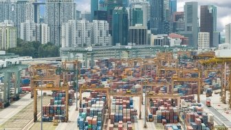 Panoramic view of Singapore harbor with Singapore city background.