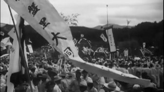 A banner with Korean text flies during a celebration.