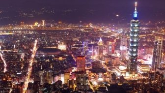 An aerial view of the city of Taipei at night.