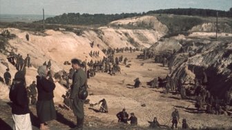 Soviet POWs covering a mass grave after the Babi Yar massacre, October 1, 1941