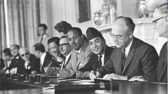 Soviet ambassador Anatoli Dobrynin signs the NPT in 1968