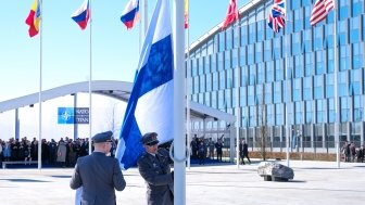 Finland installing Finnish flag at NATO