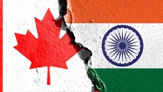 Canadian flag next to Indian flag