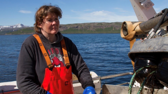 Icelandic seawoman fishing for lumpfish