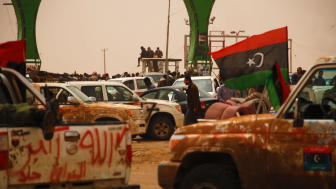 Soldiers rest after a fight with government forces. Camp of the Rebels of the anti-Gaddafi coalition. Ajdabiya, Libya, April 7, 2011