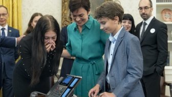 Evgenia Kara-Murza and her children talk to journalist Vladimir Kara-Murza on the phone following the prisoner swap with Russia 