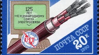 1990 USSR postage stamp recognizing the 125th anniversary of I.T.U. featuring emblem and electric cables