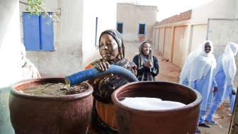 Students in Sudan receive water delivered by tanker by the UN African Union-United Nations Hybrid Operation in Darfur (UNAMID).