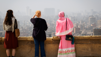 Cairo, Egypt, February 2020 three women overlooking the skyline of cairo