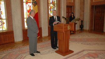 Picture of William H. Hill (right) with Vladimir Voronin, taken by the Moldovan Presidential Administration, June 2006. Hill was receiving an award at the end of his term as OSCE Head of Mission