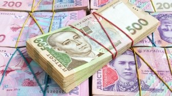 Image: Stacks of Ukrainian hryvnia UAH banknotes.