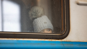 Lviv, Ukraine - March 7, 2022: Ukrainian refugees on Lviv railway station waiting for train to escape to Europe