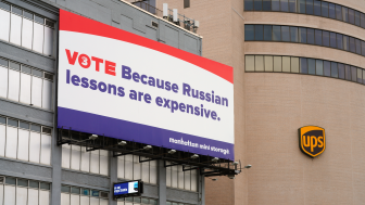 27 SEP 2020- View of a political ad on a billboard saying VOTE because Russian lessons are expensive on a Manhattan Mini Storage building in Manhattan, New York.