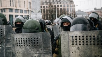 Special police unit with shields against protesters. Belarusian people participate in the protest against Lukashenko and the current authorities.