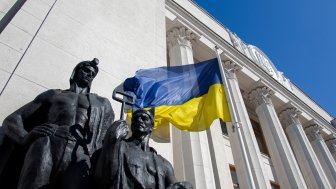 lag in front of the facade of the building of the Verkhovna Rada of Ukraine, June 2019