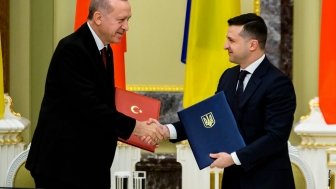 Turkish President Recep Erdogan and Ukrainian President Volodymyr Zelensky shake hands in Kiev, Ukraine February 3, 2020