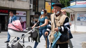 Quarantine in the city of Uzhhorod due to the COVID-19 virus. People in protective masks in the streets of the city