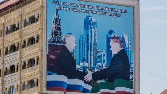 Poster of Putin and Kadyrov in Grozny, Russia. It says: I commit everything I do to common people. That's why I know I follow the right path.