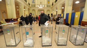 25 October 2020 People vote at at polling station during local elections in Lviv, Ukraine 