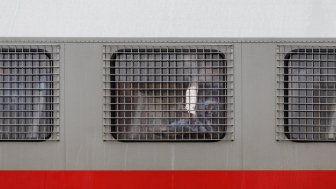 Russian national guard member inside of a riot truck