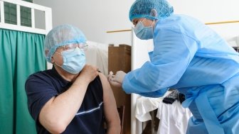 18 march 2021. Lviv, Ukraine. A health worker gets a shot of the AstraZeneca (Covishield) vaccine at the hospital. The Ministry of Health of Ukraine has publicly vaccinated health workers first