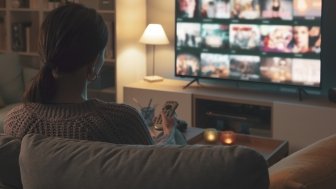 Woman watching TV series