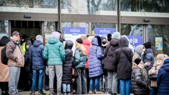 Ukrainian refugees that fleeing from the war in Ukraine gather at a refugee reception center in Riga, Latvia