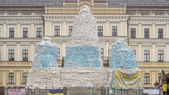 Kyiv, Ukraine - June 5 2022. Monument to Princess Olga barricaded with sandbags.