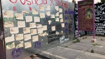 Wall full of messages claiming justice for all the women victims of violence