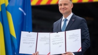 President Duda presenting signed laws