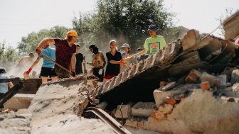 Group Cleaning up Rubble 