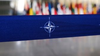 Nato logo on a banner