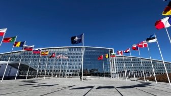 The national flags of NATO member countries outside the organization’s headquarters in Brussels, Belgium